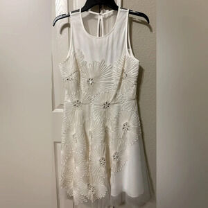 Badgley Mischka white sleeveless cocktail dress size 10 with ribbon and sequins